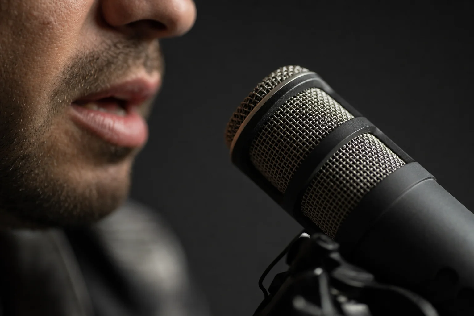 Best speech recognition software — person speaking into microphone
